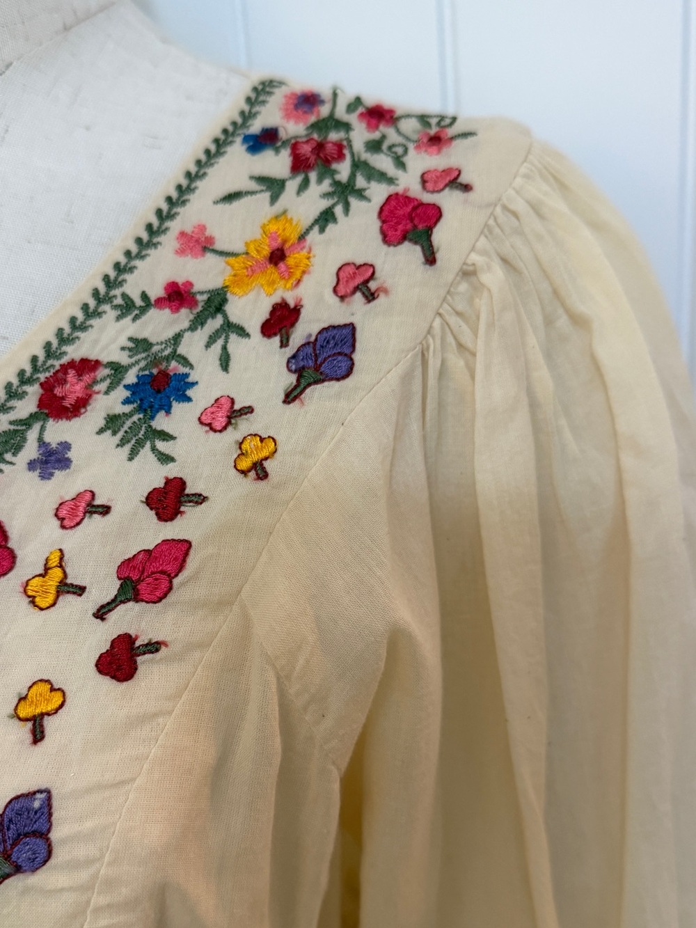 Cream Embroidered Peasant Blouse with Colorful Floral Detail - Picture 10 of 17
